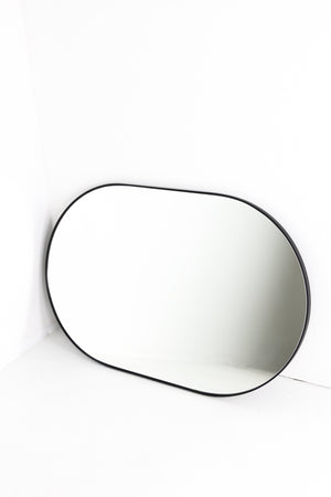 Curved rectangular black frame mirror