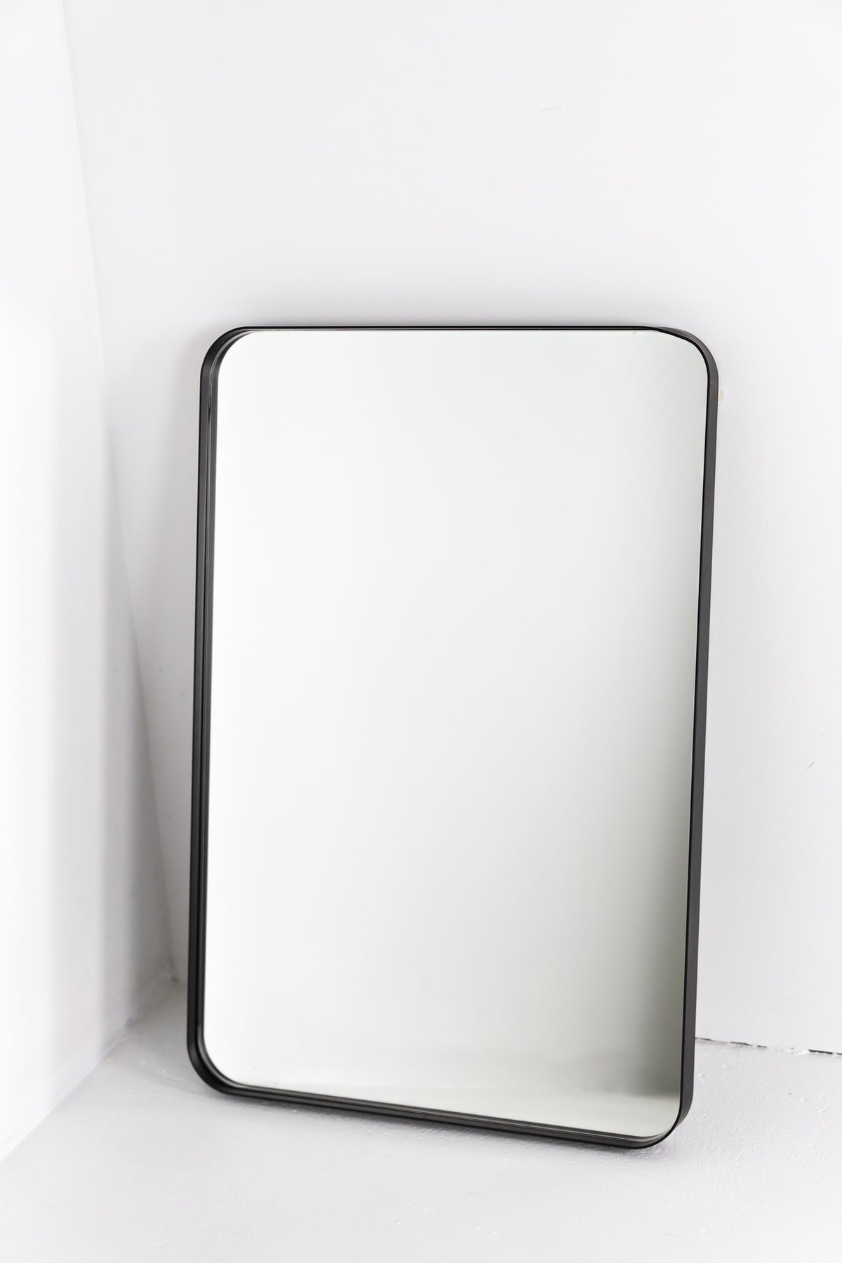 Curved edge rectangle mirror in black