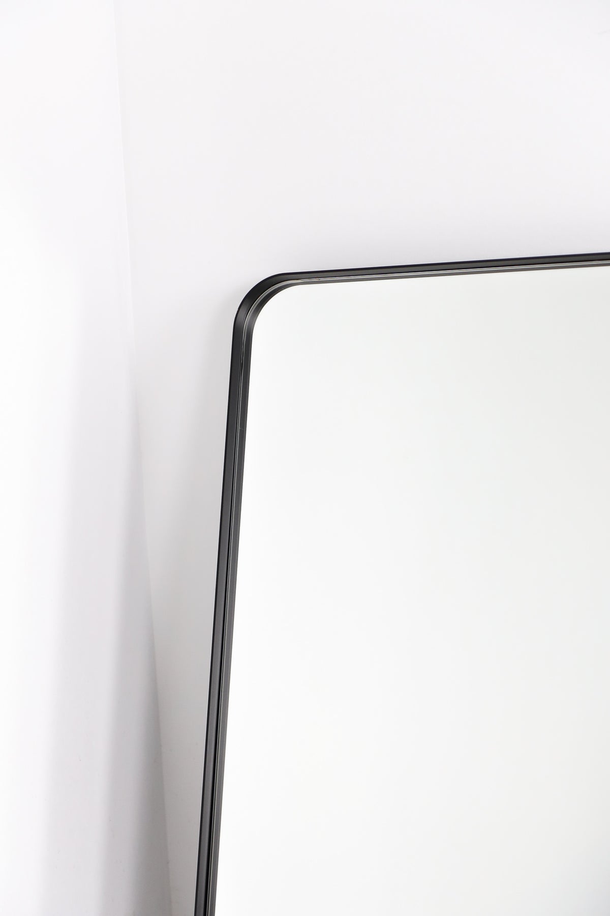 Curved edge rectangle mirror in black
