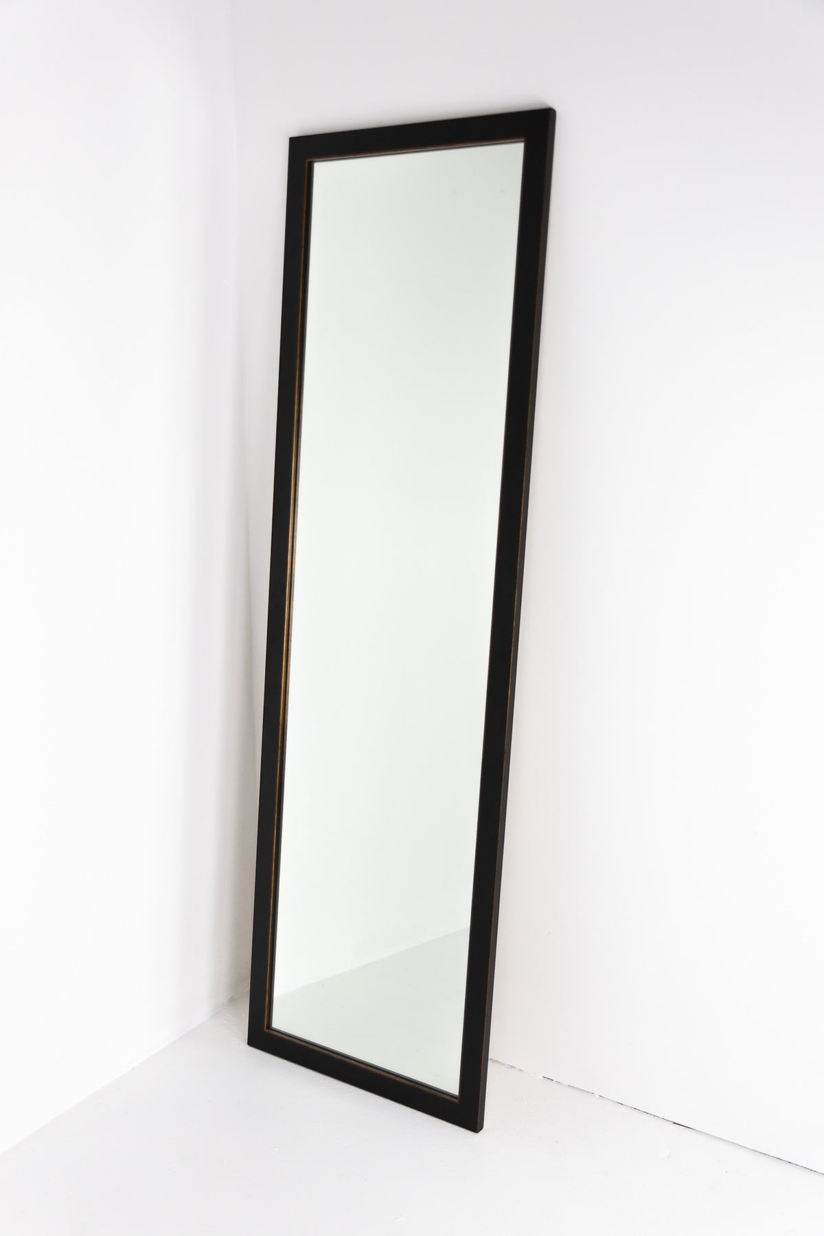 Mirror in our black gold trimmed frame