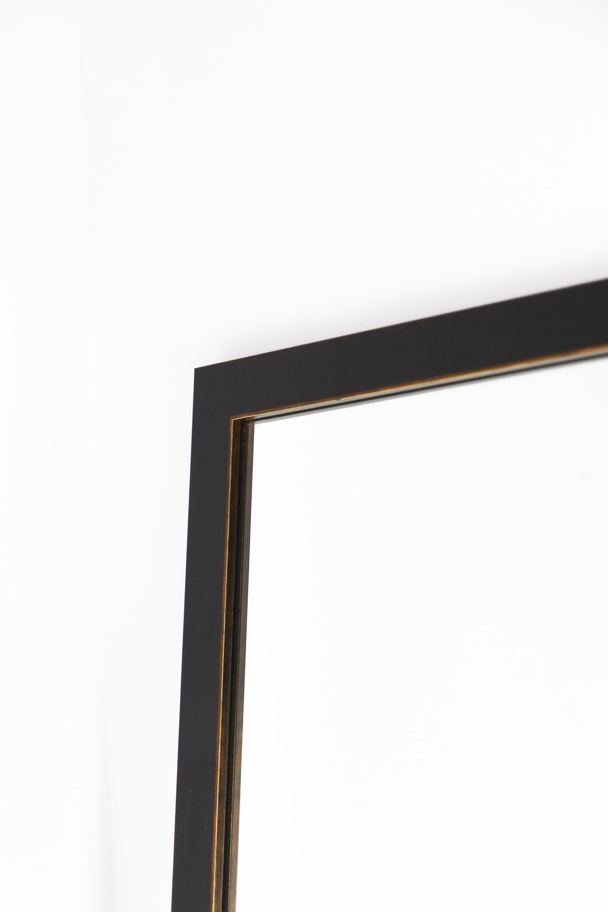 Mirror in our black gold trimmed frame