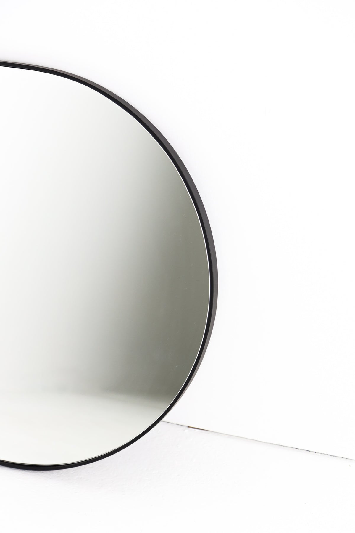 Curved rectangular black frame mirror