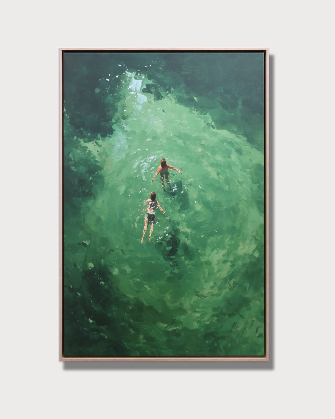 The stretched canvas set in a thin timber float frame with a shadow gap
