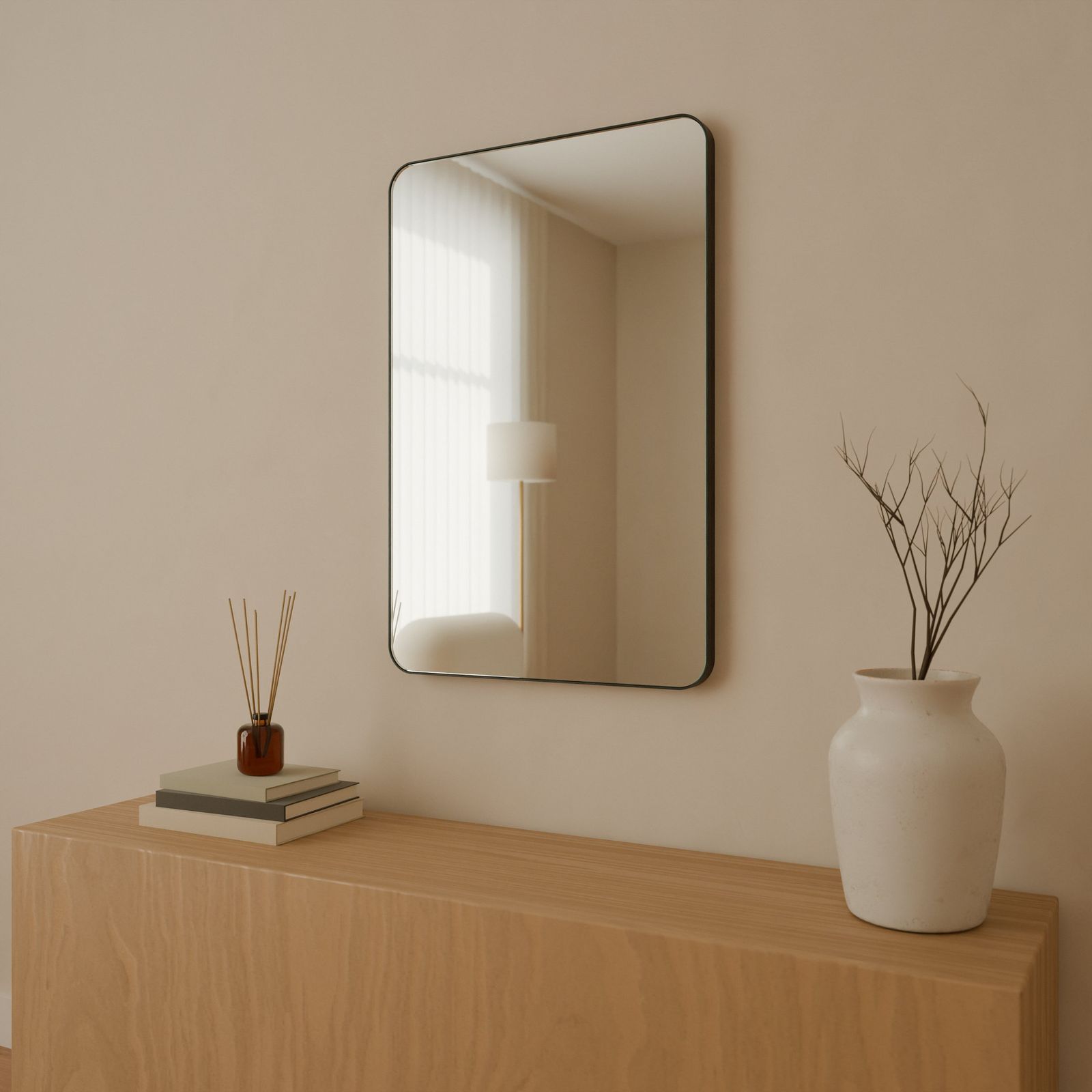 Radius Corner mirror, Metal · Black, in a room